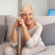 a woman smiling with dentures in Los Alamitos