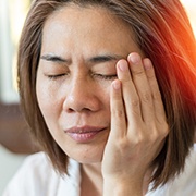 Woman with jaw pain