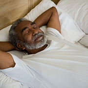 Man sleeping in bed
