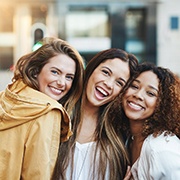 female friends smiling with veneers in Los Alamitos