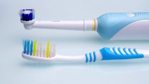 Manual and electric toothbrushes.