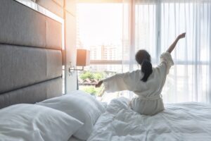 Woman rising from sleep. 